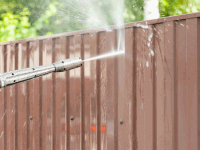 Pressure washing walls and fencing